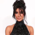 kim-kardashian-stuns-in-skintight,-crucifix-covered-halter-dress-&-stilettos-at-2023-cfda-fashion-awards