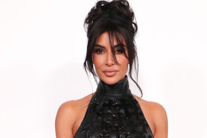 kim-kardashian-stuns-in-skintight,-crucifix-covered-halter-dress-&-stilettos-at-2023-cfda-fashion-awards