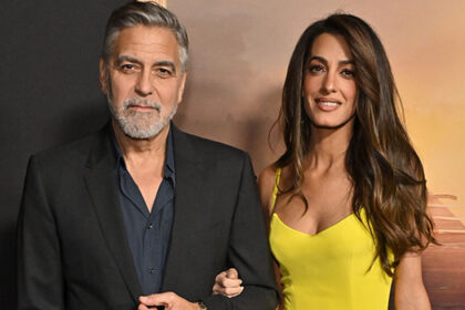 george-clooney’s-wife-amal-stuns-in-plunging-bright-yellow-gown-at-‘the-boys-in-the-boat’-premiere:-photos