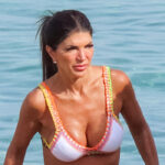teresa-giudice-sizzles-in-plunging-purple-&-green-swimsuit-during-miami-getaway