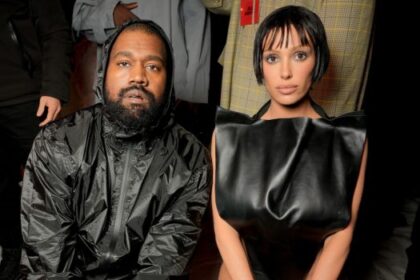 kanye-west-&-wife-bianca-censori-hold-hands-as-she-shows-her-partial-lower-backside-in-neon-leggings