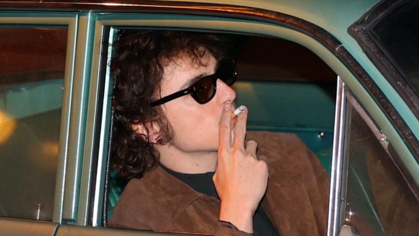timothee-chalamet-smokes-a-cigarette-on-the-set-of-bob-dylan-movie-in-new-video