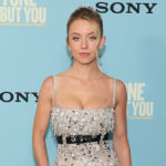 sydney-sweeney-dances-in-sexy-white-skirt-&-‘apologizes’-for-‘having-great’-breasts:-video