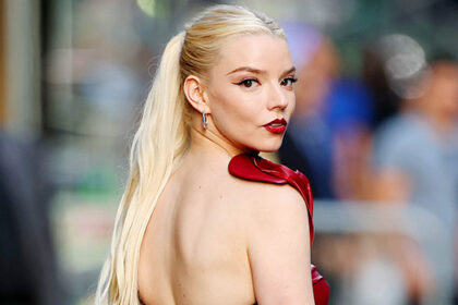 anya-taylor-joy-shows-off-backside-in-scarlet-lace-up-mini-dress:-photos
