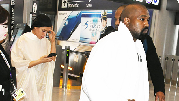 bianca-censori-covers-herself-entirely-in-flowing-dress-during-japan-trip-with-kanye-west:-photos