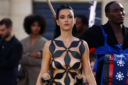 katy-perry-stuns-in-black-dress-with-revealing-cutouts-at-vogue-world:-paris-show:-photos